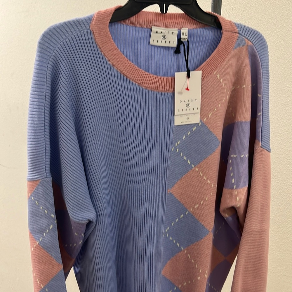 Pink and blue knitted sweater
